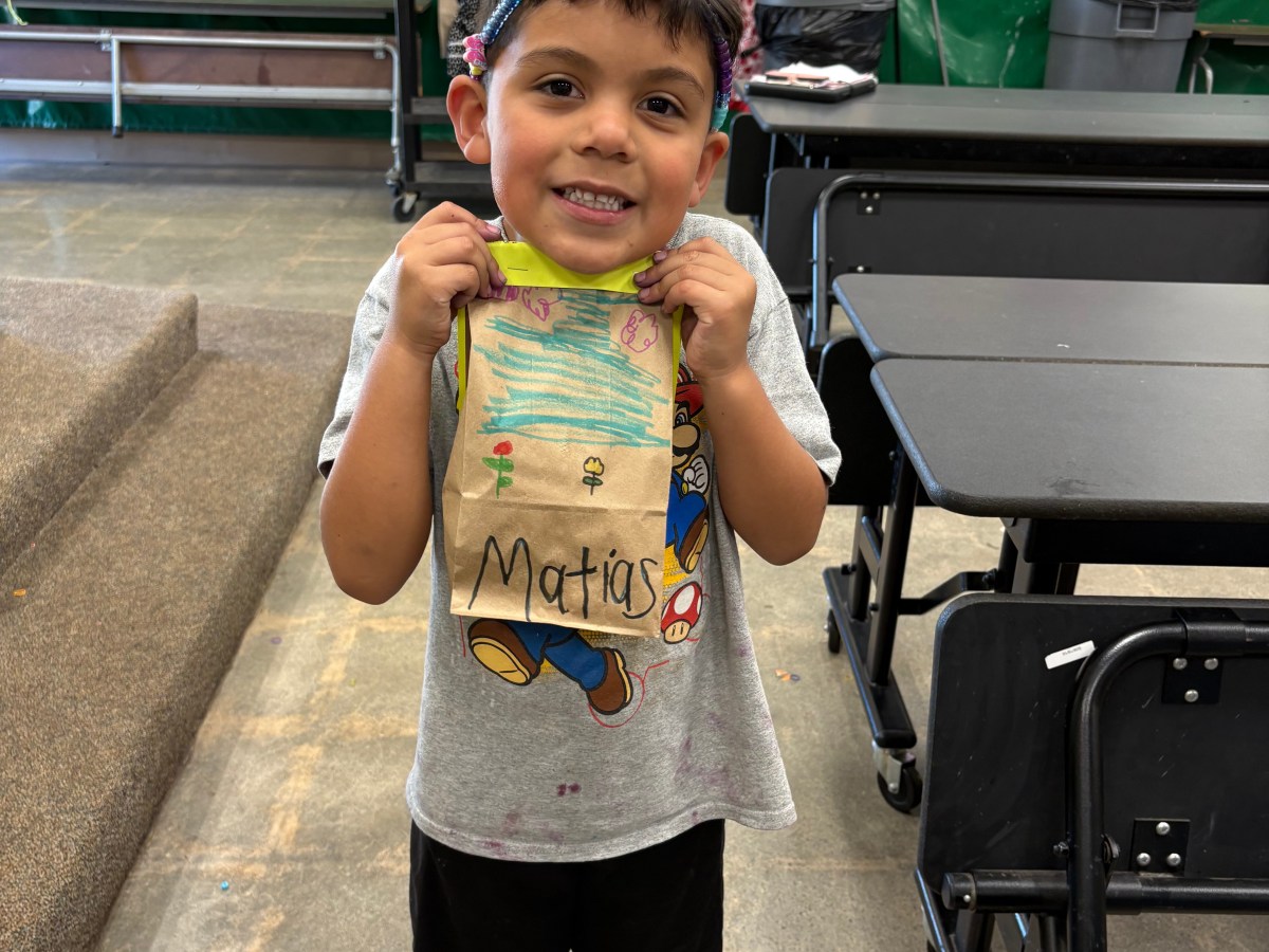 Farmington Elementary Boys & Girls Club After School Program — Matias Meija Ortega with his bag of&nbsp;seeds